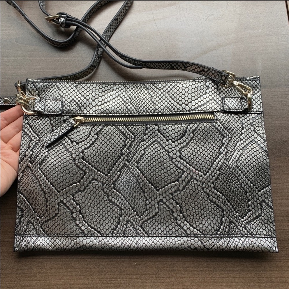 Silver Snake skin crossbody purse orange interior
